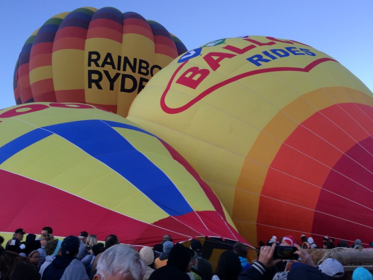 After they are rolled out, the balloons are filled with hot air