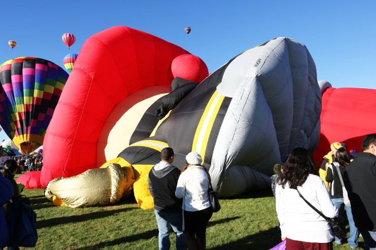 After the first batch of balloons went up, many special shape balloons started getting ready