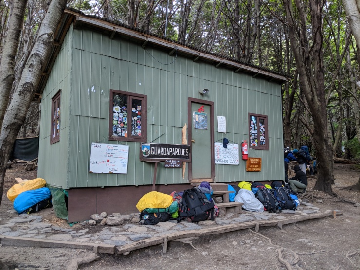 Many people leave their heavy packs at the Campamento Italiano Ranger Station.